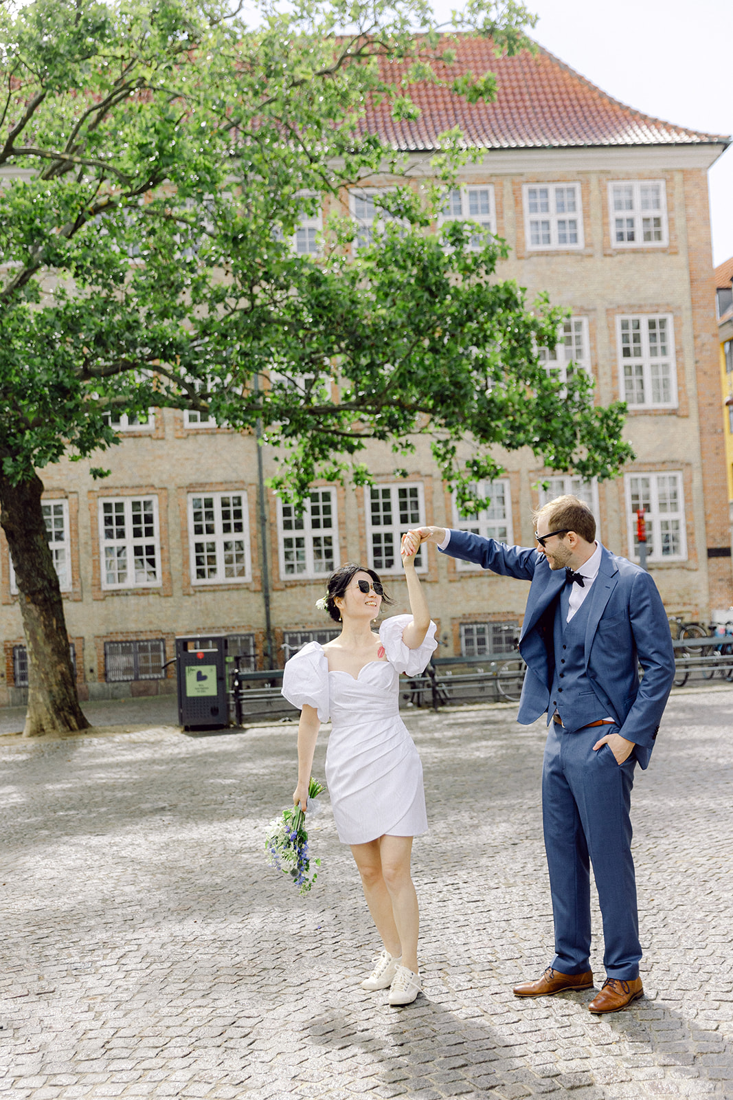 get married in Copenhagen chic couple portrait, dancing 